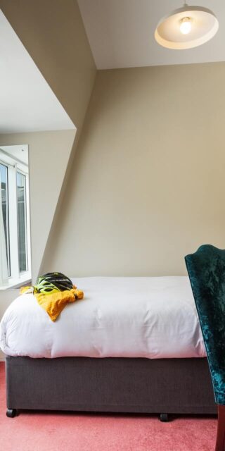 Bedrooms - Single Rooms - Glendalough Hotel Single Cosy Bedroom with cycling gear